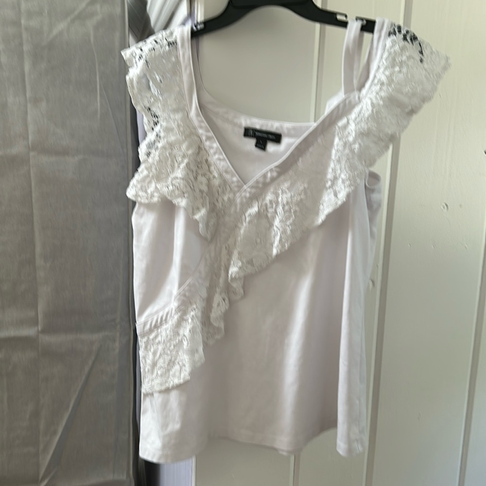 Inc lace top asymmetrical neckline.